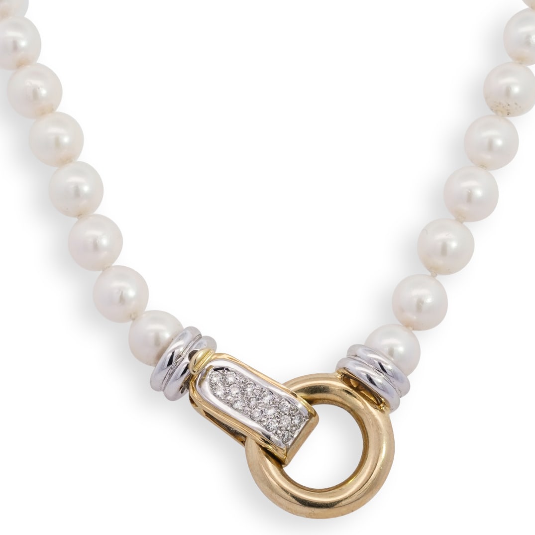 Italian 18k Gold, Beaded Pearl and Diamond Necklace: DESCRIPTION: An Italian 18k pearl beaded necklace fitted with 18k yellow and white gold toggle pendant clasp, inset with a series diamonds along the closure. stamped '750" with Italian district marks.