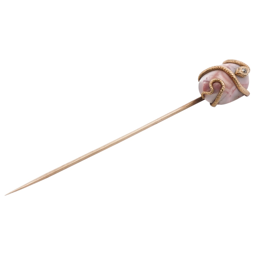 Art Nouveau 14k Gold & Agate Stick Pin: DESCRIPTION: Art nouveau 14k gold stick pin, featuring an oval shaped agate stone with a snake encompassing it. The snake has a blue hued gemstone at the center of it's head. Total weight: 2.66g (1.71