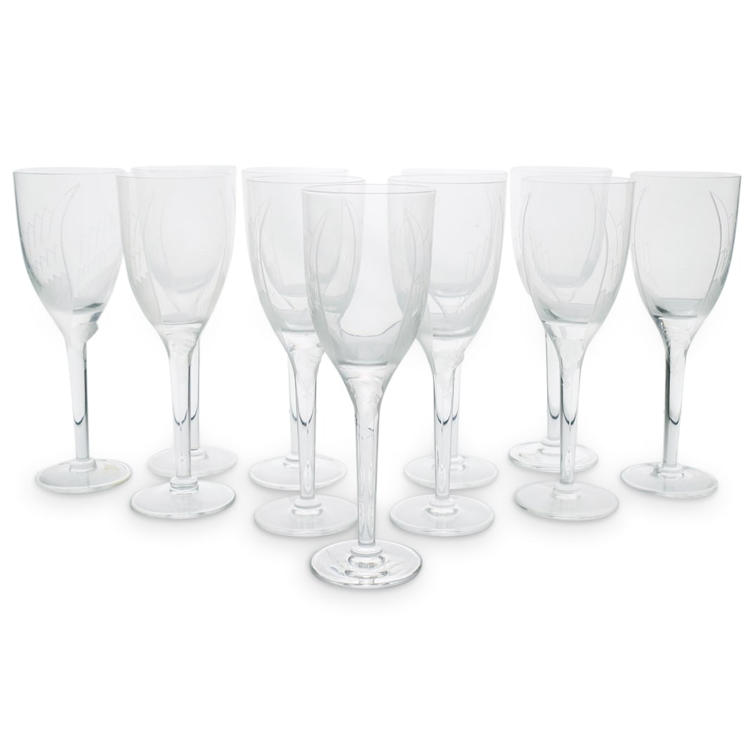(11 Pc) Lalique Crystal "Angel" Wine Glasses: DESCRIPTION: 11 piece set of Lalique crystal glass wine stemware, each crafted in the Ange pattern featuring a figure at the base of its bowl spreading its wings along the side of the bowl. Each piece