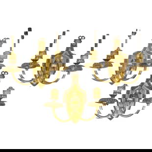 (3 Pc) E.F. Caldwell & Co. Louis XVI Style Gilt Bronze Wall Sconces: DESCRIPTION: Three E.F. Caldwell & Co. Louis XVI style ormolu bronze two-light wall sconces, each featuring foliage motifs and fluted arms, each shield-form backplate ornamented with a beadwork