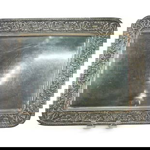 Sterling Silver "Trianon" Tray: DESCRIPTION: Sterling silver tray decorated with repousse floral, foliage, and shell motifs. Marked on underside. Total weight: 1290 g CIRCA: 20th century ORIGIN: Possibly Spanish DIMENSIONS: H: 0.5"