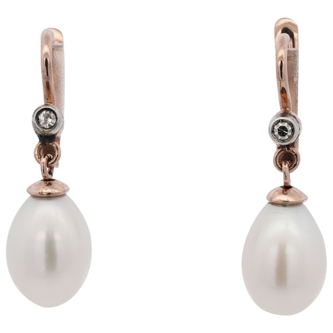 Vintage 14k Rose Gold, Diamond, and Pearl Earrings: DESCRIPTION: Vintage imperial era 14k rose gold earrings, each decorated with one round diamond and a dangling natural pearl. Russian hallmarks "56 AP" Total weight: 5.6g (3.59 dwt) CIRCA: Late 19th -