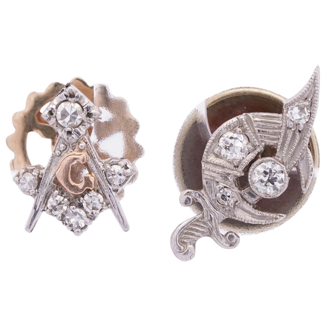 (2 Pc) 14K Gold And Diamond Freemason Pins: DESCRIPTION: Two Freemason pins - one for the Freemasons in general crafted as the square and compass emblazoned with a "G", one for the Shriners fashioned as a sword and crescent. Each piece is marke
