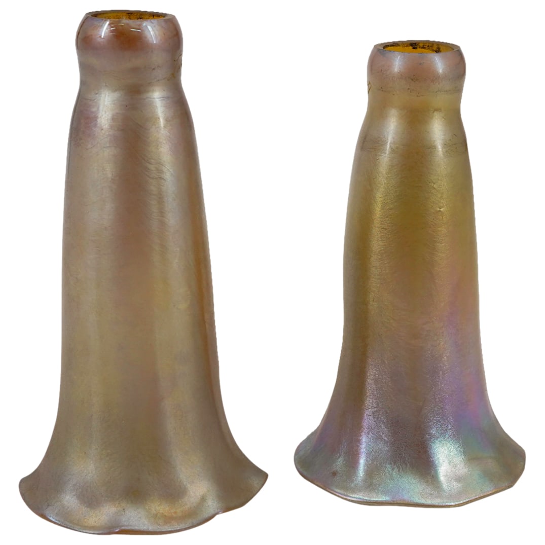 (2 Pc) Lotton Lily Lamp Shades: DESCRIPTION: Pair of gold iridescent lily glass lamp shades, etched signature near base "Lotton 1978" CIRCA: 1978 ORIGIN: USA DIMENSIONS: H: 5.5" D: 2.75" Inner D: 1" , H: 5" D: 2.75" Inner D: 1" COND