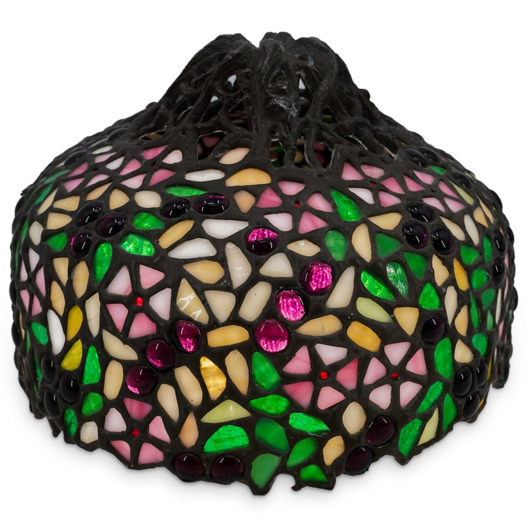 Tiffany Style Leaded Stained Glass Lamp Shade: DESCRIPTION: Tiffany style leaded stained glass lamp shade, featuring florals designs and grapes throughout. Top of shade mimics a root like structure. CIRCA: 20th Century ORIGIN: DIMENSIONS: H: 7" D: