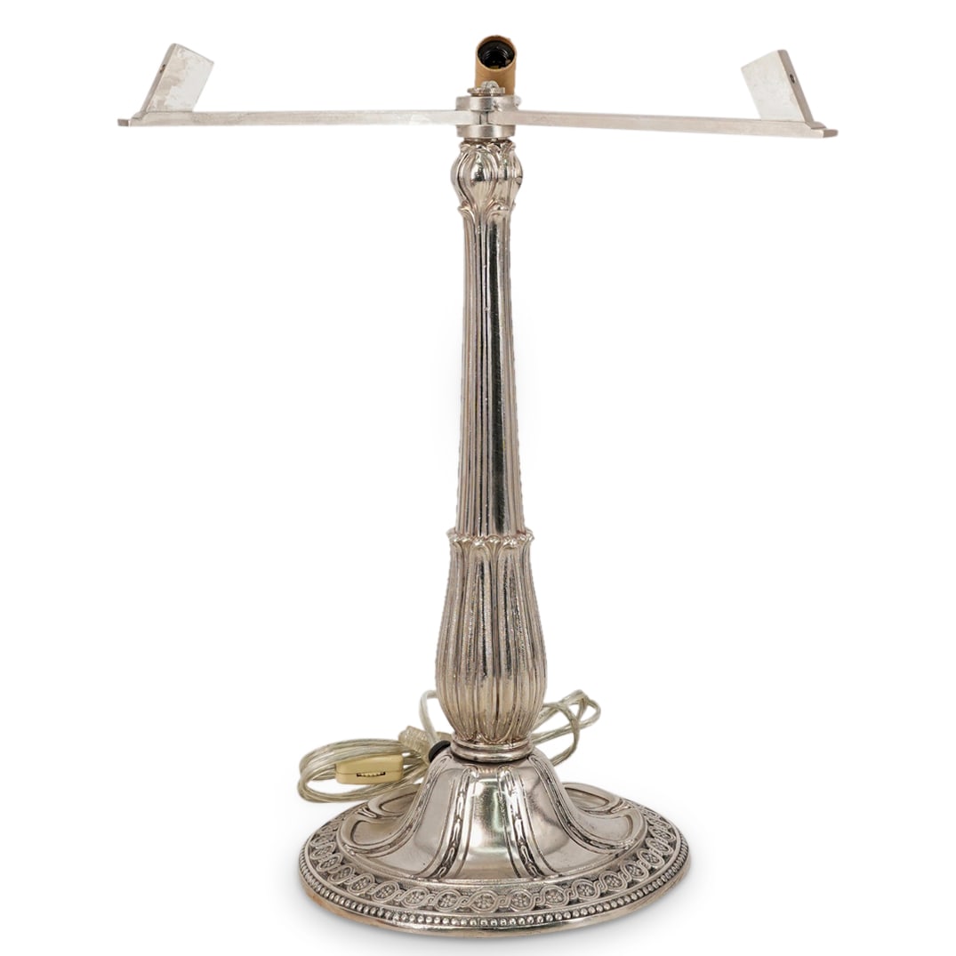 Art Deco Miller Lamp Co. Silvered Metal Lamp Base: DESCRIPTION: Art Deco Miller Lamp Co. silvered metal lamp base dating 1900s. Model number: #236. Depicts a base to hold a semi dome glass shade (not included). CIRCA: Early 20th Century ORIGIN: USA DI