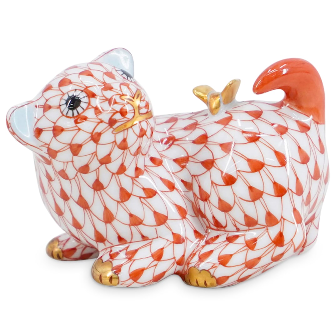 Herend Porcelain "Puppy W/ Butterfly" Rust Fishnet Figurine: DESCRIPTION: Herend porcelain "Puppy with butterfly" rust fishnet figurine. Model: 15852. Marled with Herend hallmarks on the underside. CIRCA: 2006 ORIGIN: Hungary DIMENSIONS: H: 2" W: 2 1/2" CONDITI