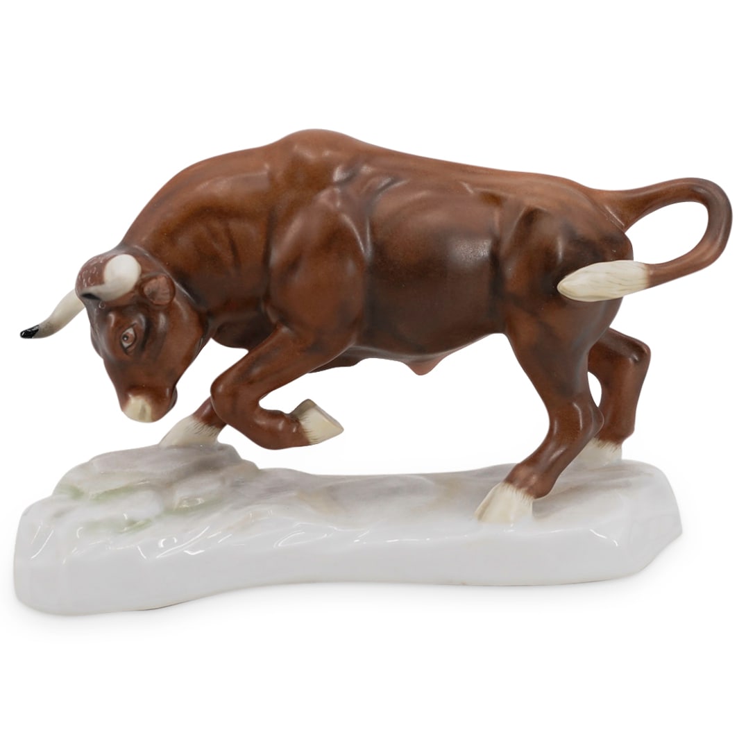 Herend Hand Painted Porcelain "Kingdom Classic" Bull Figurine.: DESCRIPTION: Herend Hand Painted Porcelain "Kingdom Classic" Bull Figurine. In brown fishnet pattern, completed with gilded accents and stands over a rock formation. Stamped "Herend Hungary" on bottom