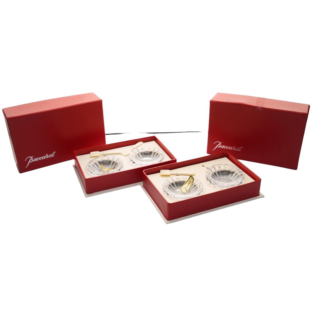 (4 Pc) Baccarat Crystal Open Salt Cellar Sets: DESCRIPTION: Set of 4 Baccarat crystal open salt cellars, each come with original box, two crystal salt cellars, and carved bone spoons. CIRCA: 20th Century ORIGIN: France DIMENSIONS: Salt Cellar D: 2
