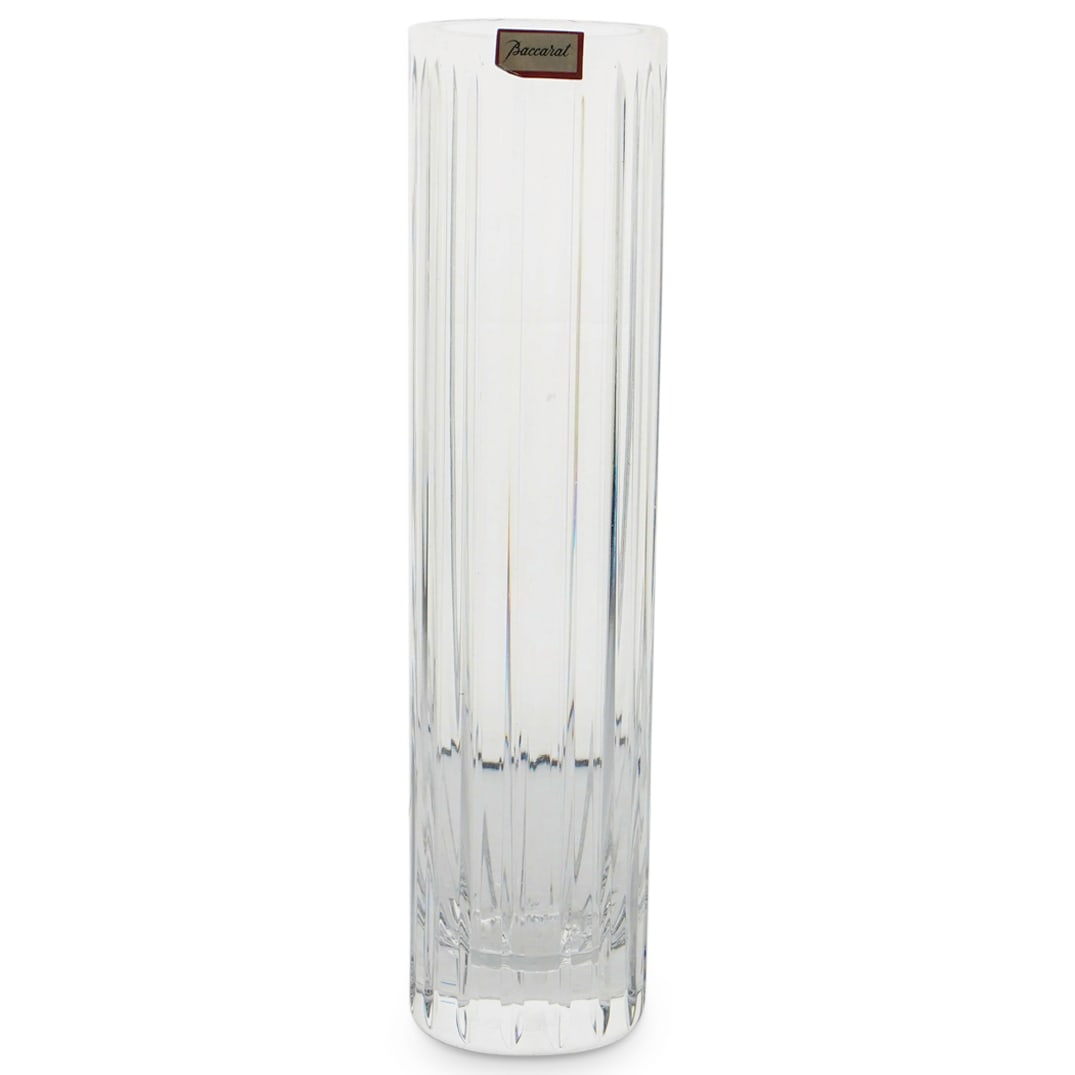 Baccarat Crystal "Harmonie" Flower Vase: DESCRIPTION: Baccarat Crystal "Harmonie" Flower Vase. Designed with vertical lines. Marked with Baccarat hallmark. CIRCA: 20th century ORIGIN: France DIMENSIONS: H: 7 7/8" CONDITION: Good Condition Un