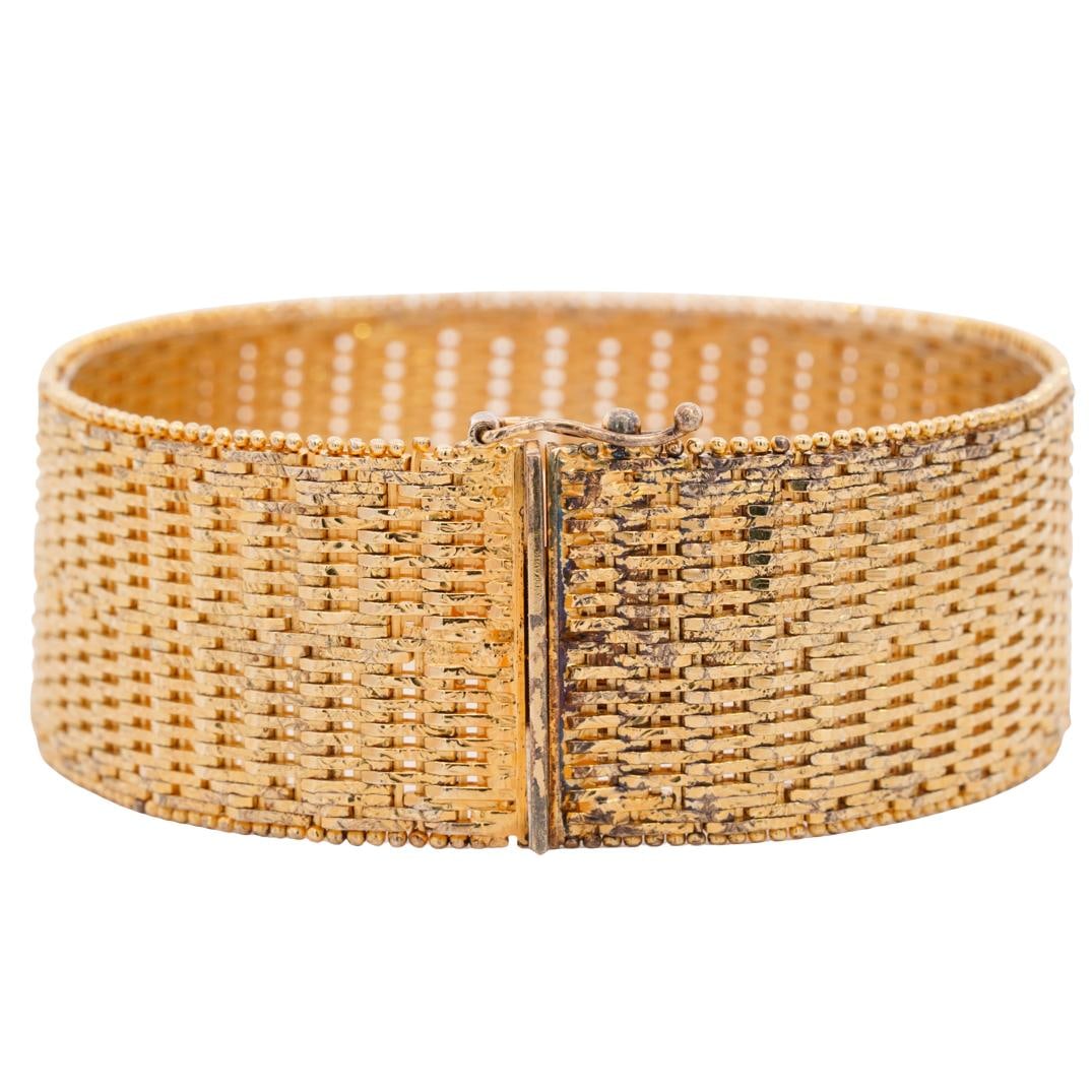 Vintage Italian Sterling Silver Vermeil Bracelet: DESCRIPTION: Sterling silver vermeil bracelet hallmarked with "V" and "925 Italy" on clasps. Total weight: 66 g. CIRCA: 20th Century ORIGIN: Italy DIMENSIONS: Bracelet size - 7.25" CONDITION: Minor we