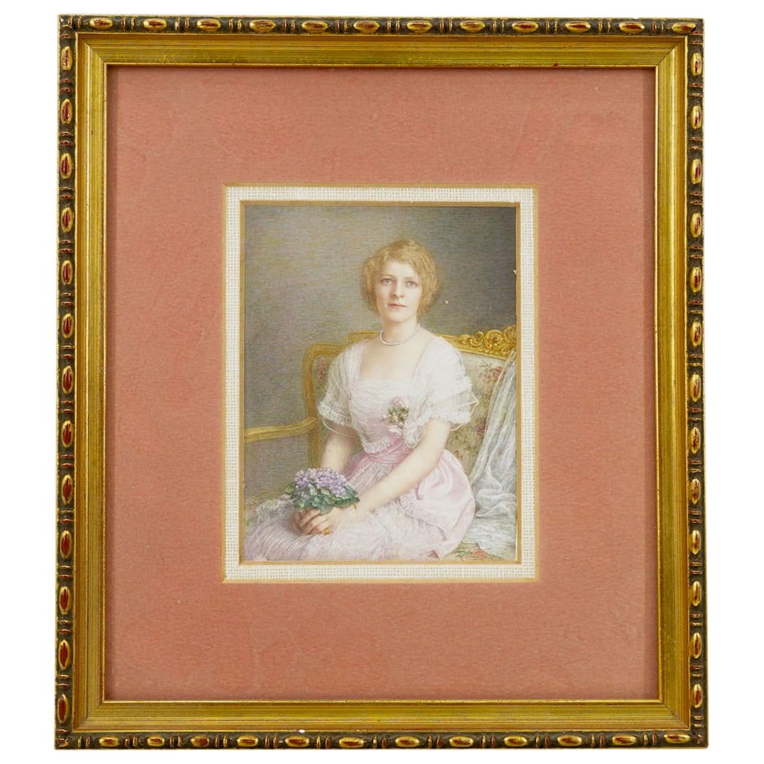 European Lady's Portrait Oil On Bone: DESCRIPTION: Oil on bone painting depicting a seated woman wearing a pink dress and holding a bouquet of purple flowers. Mounted in a gilt wooden frame. CIRCA: 1870s-1930s ORIGIN: Europe DIMENSIONS: W