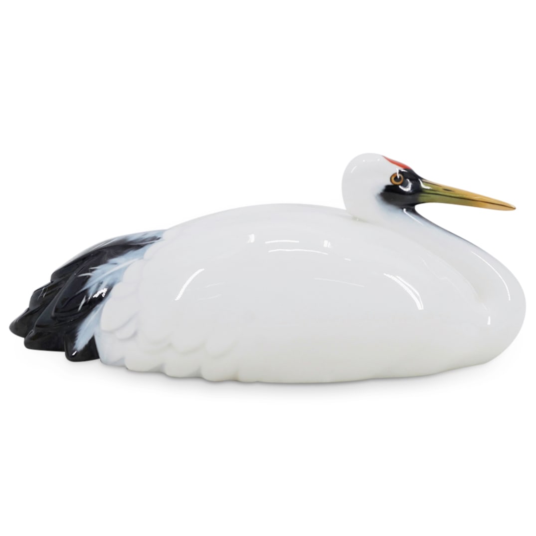 Japanese Noritake Glazed Porcelain Bird Figurine: DESCRIPTION: Japanese Noritake Glazed Porcelain 'Crane Bird' Figurine. Marked with 'Noritake' hallmarks. CIRCA: 20th Century ORIGIN: Japan DIMENSIONS: H: 4" W: 9" CONDITION: Good Condition Unless othe