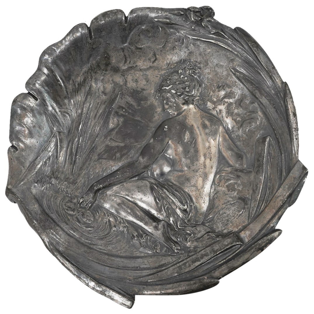 Art Nouveau Jean Garnier Bas-Relief Spelter Figural Plate: DESCRIPTION: Art Nouveau spelter bas-relief figural plate by Jean Garnier (French, 1853 - 1910). Depict a semi nude female figure bathing at the pond. With 'J. Garnier' etched signature. CIRCA: Early
