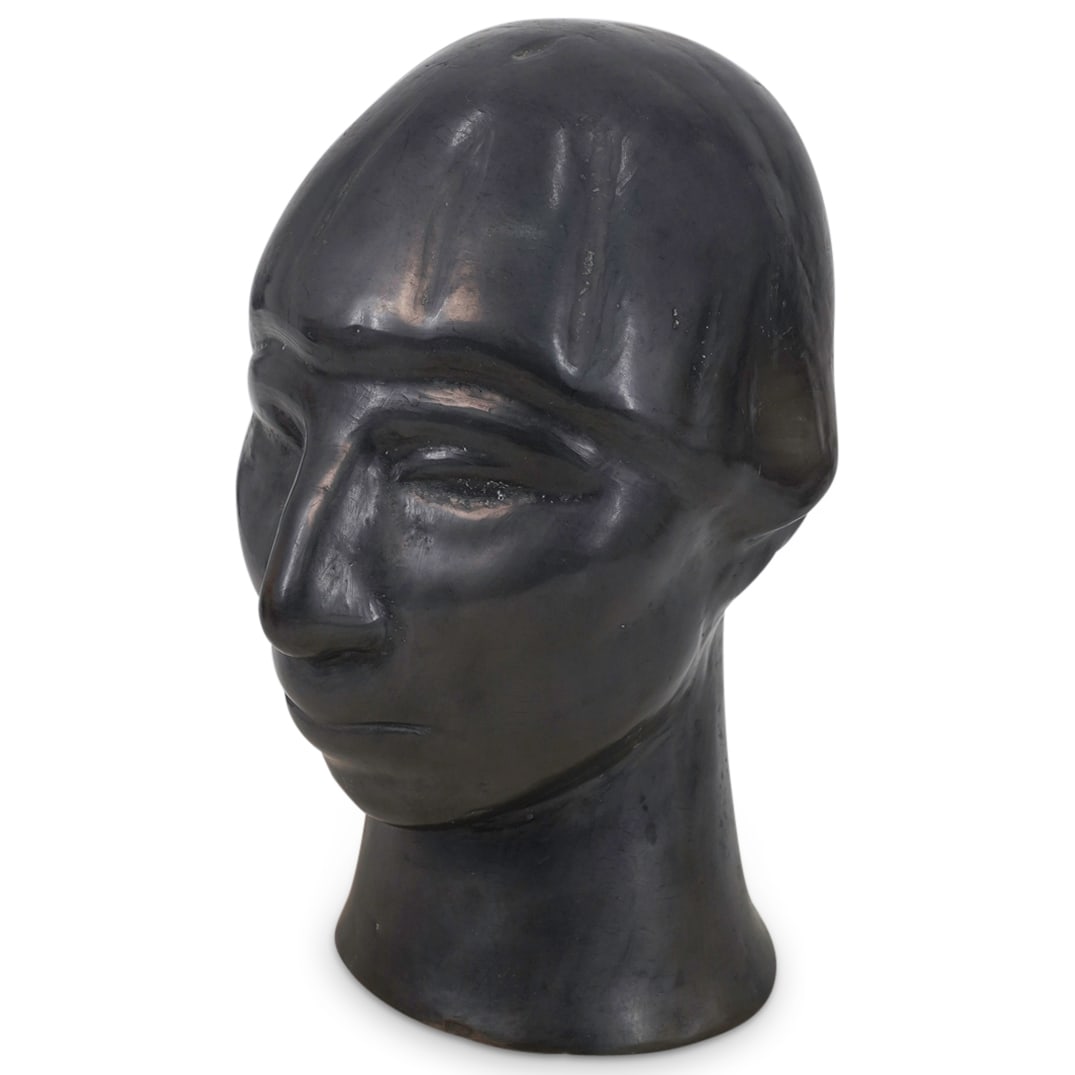 Mexican Oaxacan Black Pottery Male Bust: DESCRIPTION: Mexican Oaxacan black pottery bust of a man. Marked "Oaxaca Mexico" on the interior. CIRCA: 20th Century ORIGIN: Mexico DIMENSIONS: H: 10 1/2" W: 6" CONDITION: Good Condition Unless other