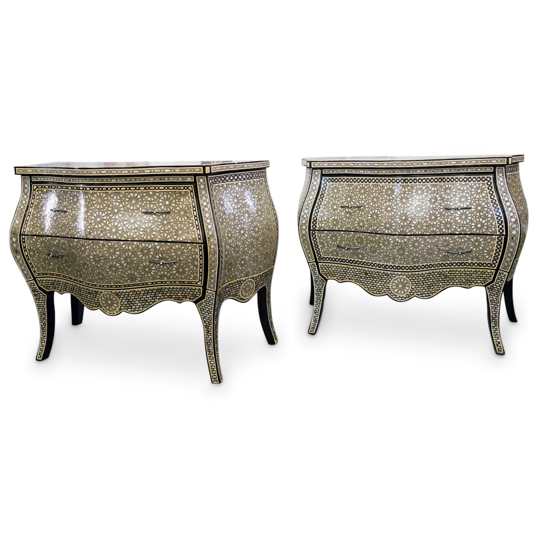 Pair of Syrian MOP Inlaid Commodes: DESCRIPTION: DESCRIPTION: Pair of Syrian mother of pearl inlaid commodes with two stacked pull-out storage drawers and rich black lacquered finishes. Label at underside: 'Loyd-Paxton. Works of Art'Pro