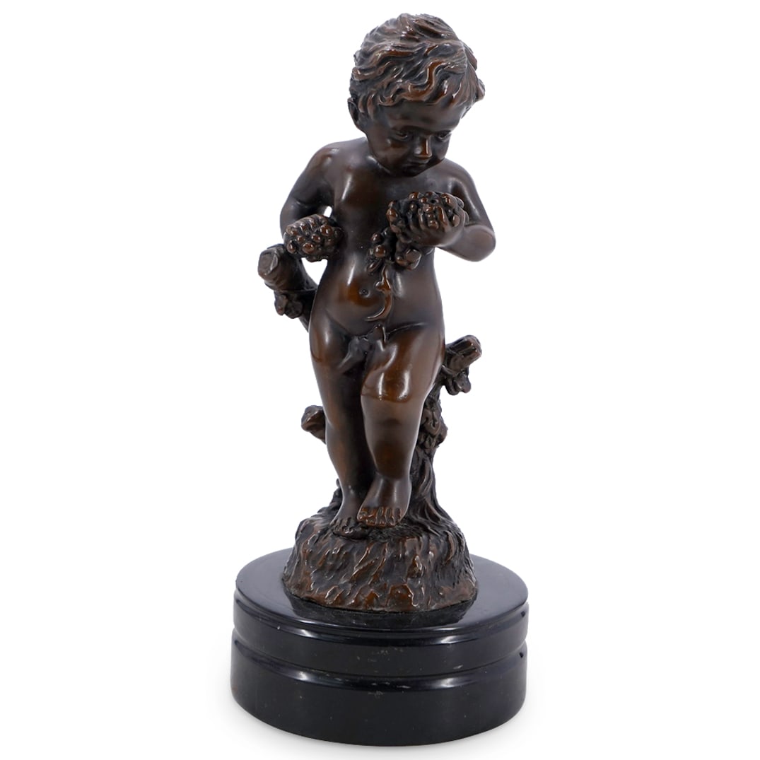 After Auguste Moreau Bronze Putti Sculpture: DESCRIPTION: Bronze sculpture after Auguste Moreau depicting a putto holding two clusters of grapes. "Aug. Moreau" at back. Mounted atop a slate base.CIRCA: 19th - 20th centuryORIGIN: -DIMENSIONS: H: