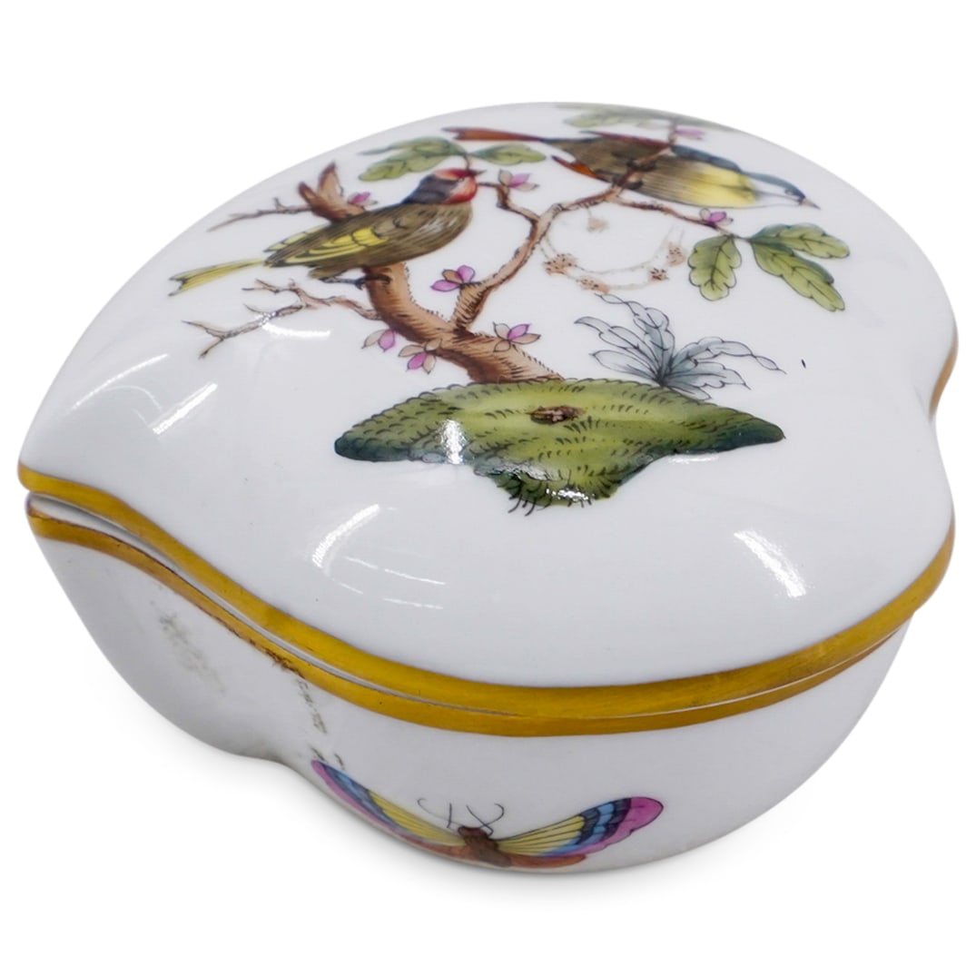 Herend Porcelain "Rothschild Bird" Heart-Shaped Bon Bon & Lid: DESCRIPTION: Herend Porcelain "Rothschild Bird" Heart-Shaped Bon Bon and Lid. Decorated with birds, butterflies and insects motifs. Model number 6005. Marked with Herend hallmark on the underside.CIRC