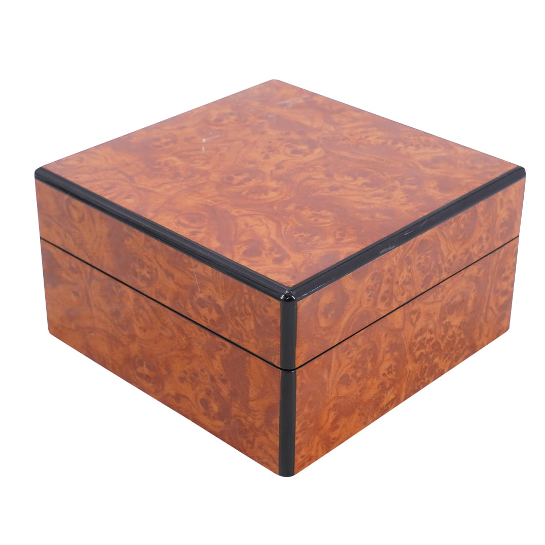 Vintage Burl Wooden Jewelry Watch Box: DESCRIPTION: Vintage burl wooden jewelry watch box with black velvet lining interior.CIRCA: 20th CenturyORIGIN: ContinentalDIMENSIONS: H: 4" W: 7 1/4" L: 7 1/4"CONDITION: With visible scratches. Unles