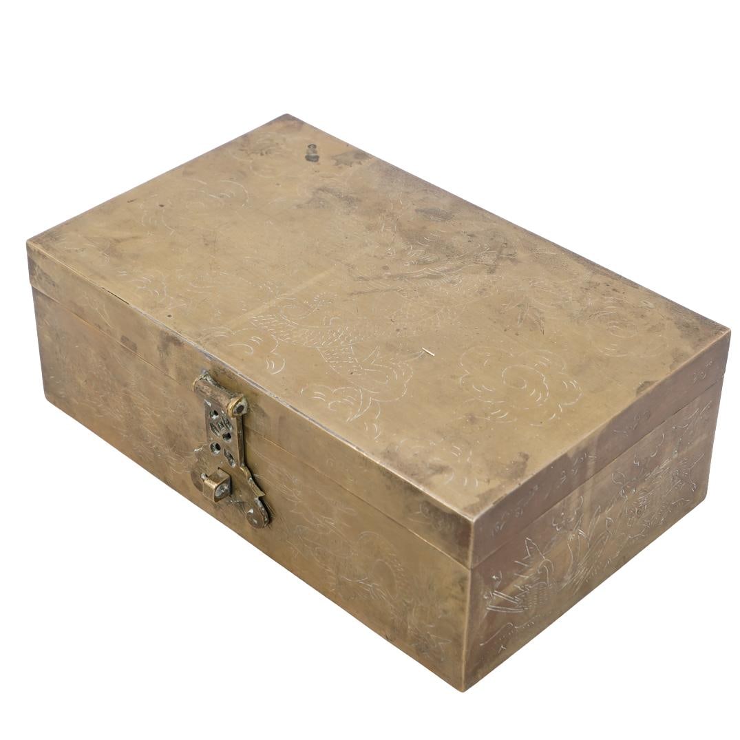 Antique Chinese Etched Brass & Wood Lined Dragon Design Box: DESCRIPTION: Antique Chinese brass box, with hinged cover, designed with a brass exterior with engraved dragon motifs, and a wood lining interior.CIRCA: Early 20th centuryORIGIN: ChinaDIMENSIONS: H: 3