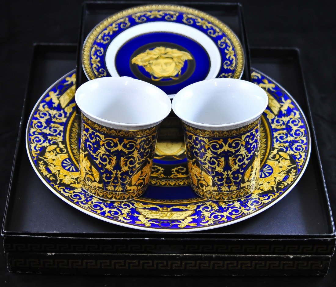 Set of 12 Rosenthal by Versace "Medusa Blue": DESCRIPTION: Set of 12 "Medusa Blue" Rosenthal porcelain dinner set by famous Italian designer Versace. 2 extra large plates (12.25" in diameter). 2 large plates (10:50" in diameter) 2 medium plates (