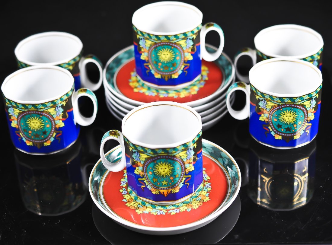 Set of 6 Rosenthal tea cups and saucers by Versace: DESCRIPTION: Set of 6 " Le Roi Soleil" Rosenthal tea cups and saucers by famous Italian designer Versace. Saucers measure (H: 0.50" L: 4.35") Cups measure ( H: 2.25" L: 2.25") CIRCA: Late 20th Century