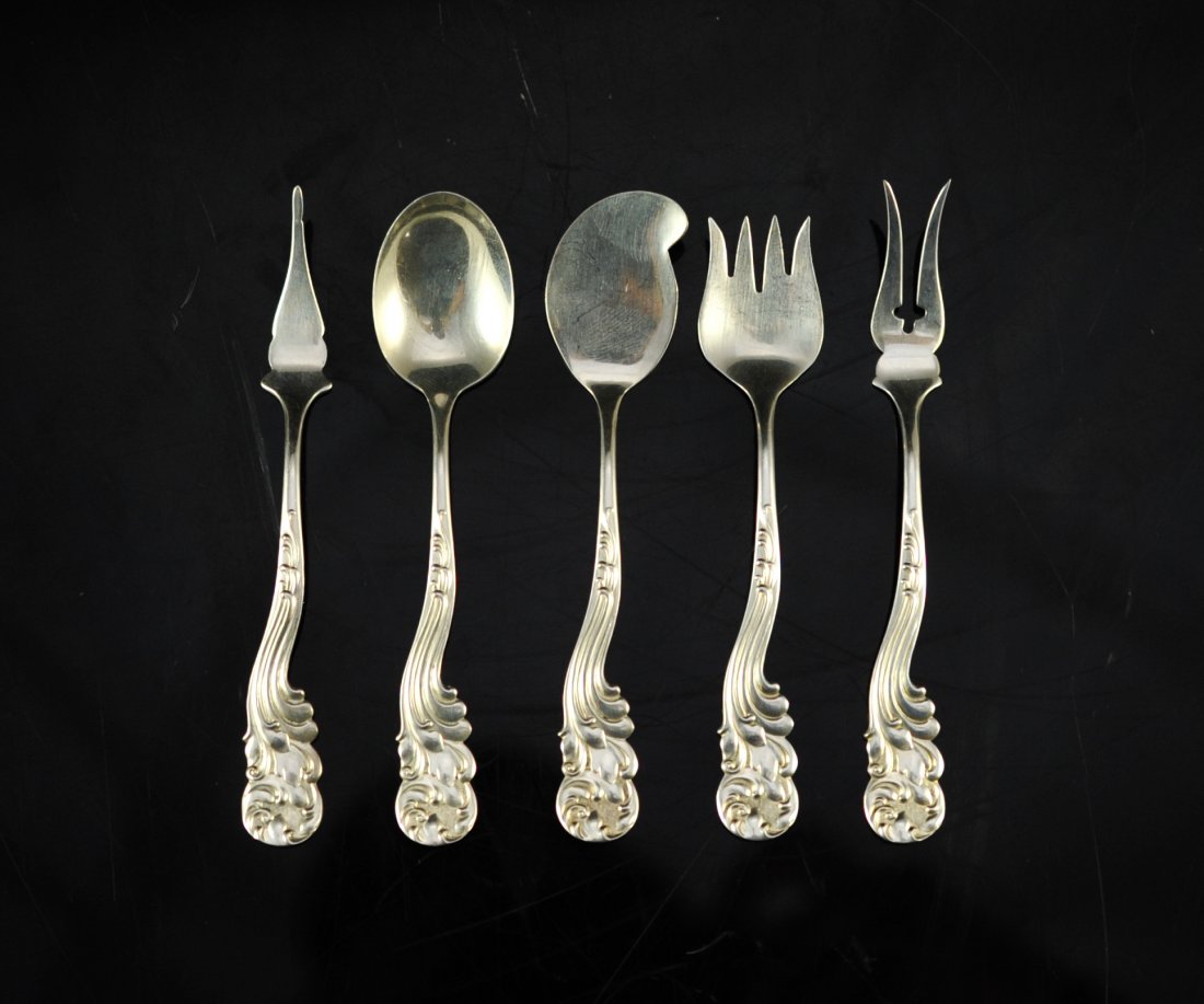Set of five sterling utensils. Single place settin: DESCRIPTION: Set of five sterling utensils. Single place setting. Baroque style handles. Hallmarked "Sterling" on the back of each piece with the makers mark "W". 82.6 grams CIRCA: 1960's-1980's ORIGI