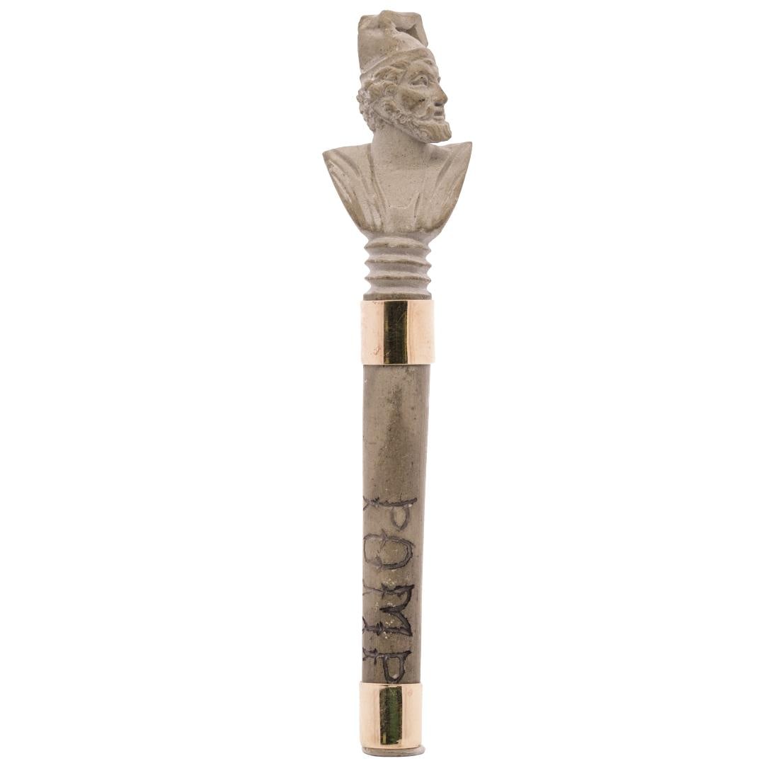 19th Century 14k Gold Lava Pin: DESCRIPTION: 19th century 14k gold pin, featuring a carved lava bust of a bearded Roman man atop a cylinder carved with the word "POMP" 14k gold pin attached, hallmarked "14k" CIRCA: 19th Century ORIG