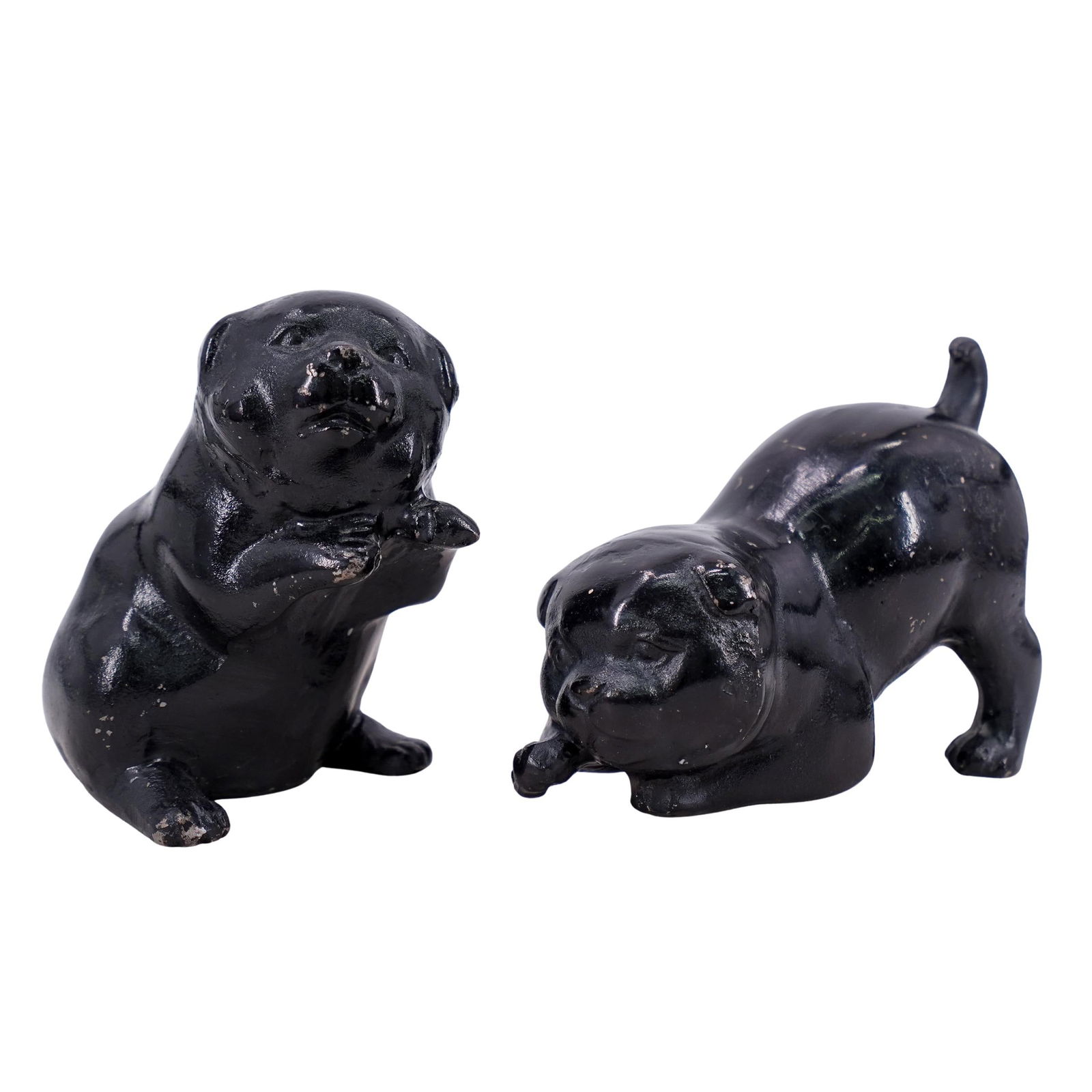 (2 Pc) Cast Iron Puppy Doorstops: DESCRIPTION: Pair of cast iron puppy door stoppers, painted black. CIRCA: 20th Century ORIGIN: USA DIMENSIONS: H: 6" W: 3" L: 6.5" CONDITION: Normal wear consistent with age and use. Unless otherwise