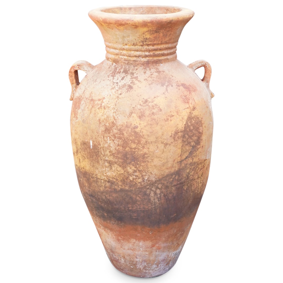 Monumental Terracotta Oil Jug: DESCRIPTION: Monumental terracotta olive oil jug with cylindrical form. CIRCA: 20th Cent. ORIGIN: Italy DIMENSIONS: H: 43" x Dia: 25" CONDITION: Great overall condition. Unless otherwise stated, all i