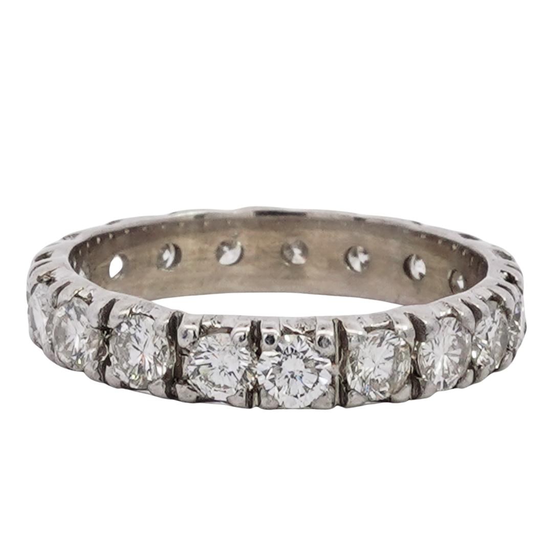 18k White Gold and Diamond Eternity Ring: DESCRIPTION: 18k white gold eternity ring, featuring round cut diamonds throughout (approx. 2 carats) Total weight: 2.94g (1.89 dwt) CIRCA: 21st Century ORIGIN: Continental DIMENSIONS: Size 6 CONDITIO