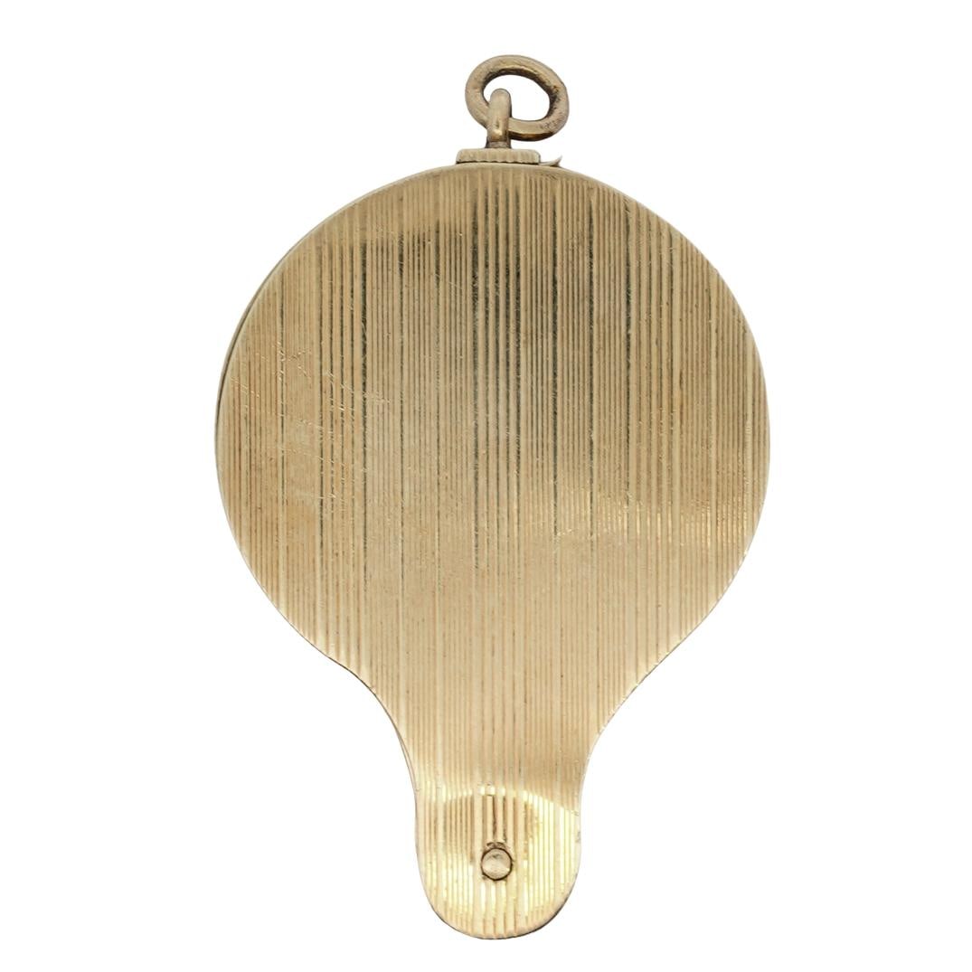 Cartier 14k Gold Loupe: DESCRIPTION: Cartier 14k yellow gold loupe magnifying glass with bail, hallmarked "14k" "Cartier New York" Total weight: 30.07g (19.34 dwt) CIRCA: 20th Century ORIGIN: France DIMENSIONS: H: 2" L: 1.25