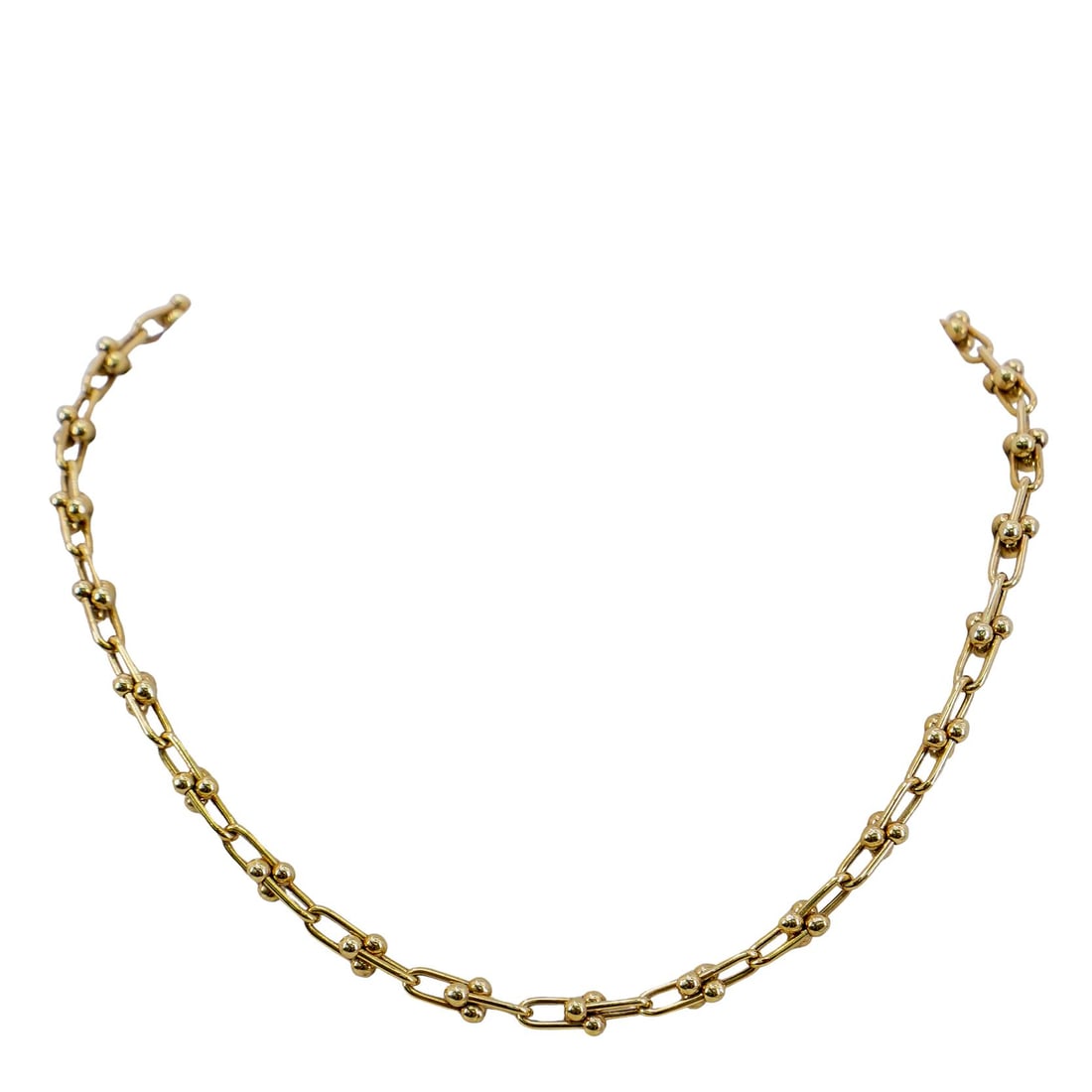 Tiffany & Co. Style 14K Gold Necklace: DESCRIPTION: Tiffany & Co. style gold hardware necklace. marked 14k. Total weight: 16.69g (10.73 dwt) CIRCA: 21st Century ORIGIN: USA DIMENSIONS: L: 16" CONDITION: Great condition. Unless otherwise st