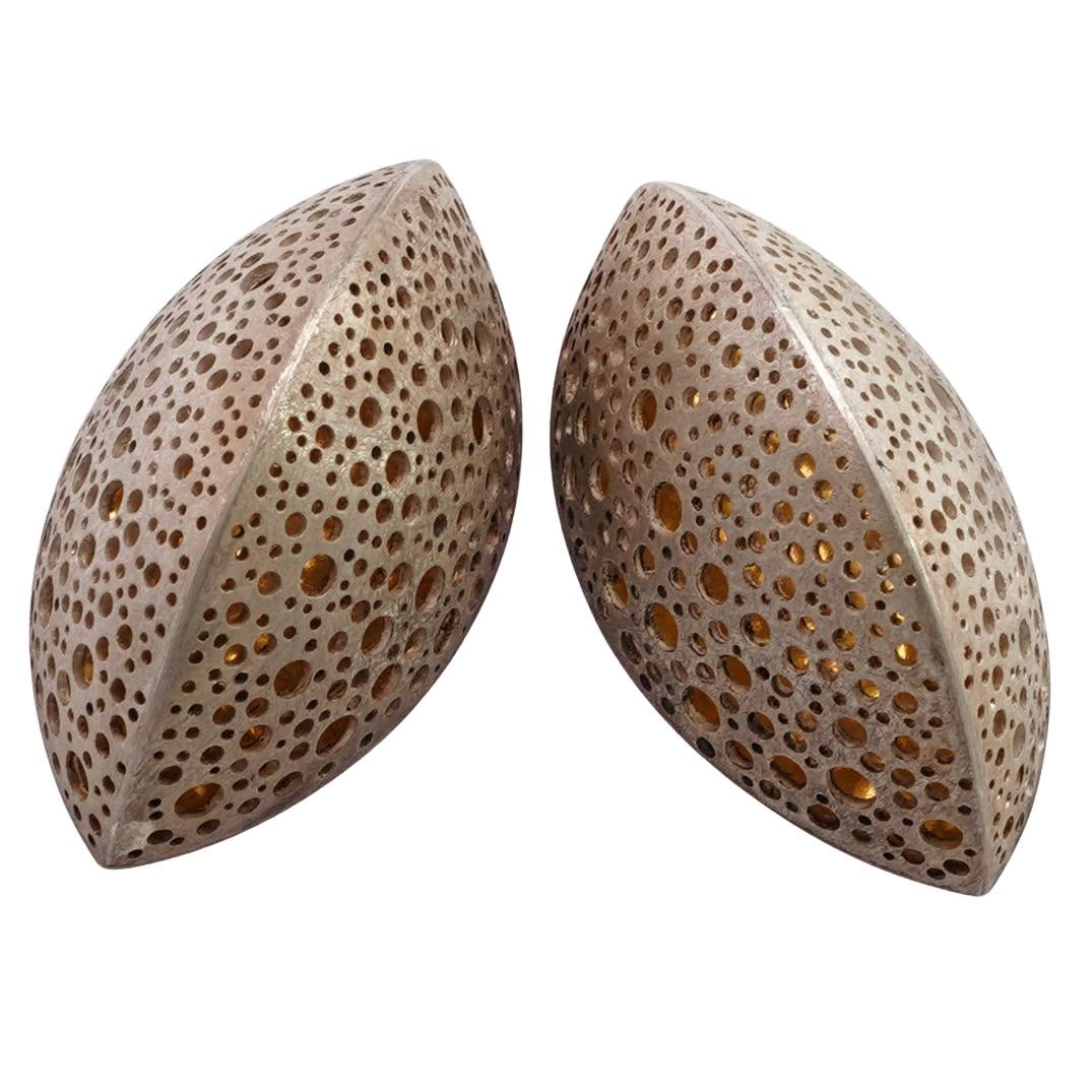 Sandra Enterline (USA. Born 1960) Sterling and 22k Gold Perforated Earrings: DESCRIPTION: A pair of earrings by Sandra Enterline feature a sterling silver and 22k gold foundation with a perforated design. Marked "Sandra Enterline" and "22k". Total Weight: 19 Grams CIRCA: 1990s