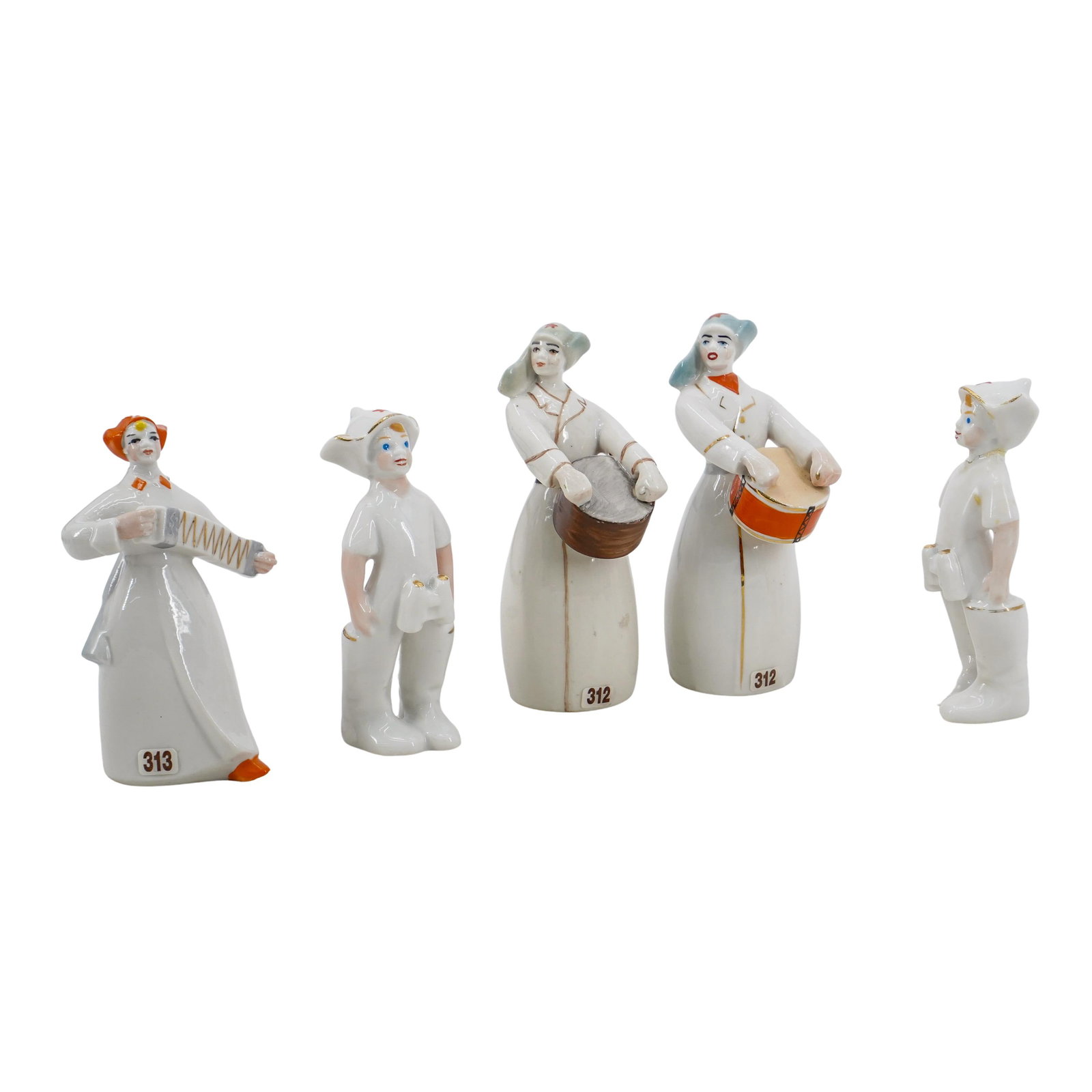 (5 Pc) Soviet Porcelain Figures: DESCRIPTION: Five Soviet porcelain figures, each wearing a budenovka hat decorated with a red star. (1) Polonne Porcelain Factory figure depicting a woman with a rifle playing an accordion. Stamped ma