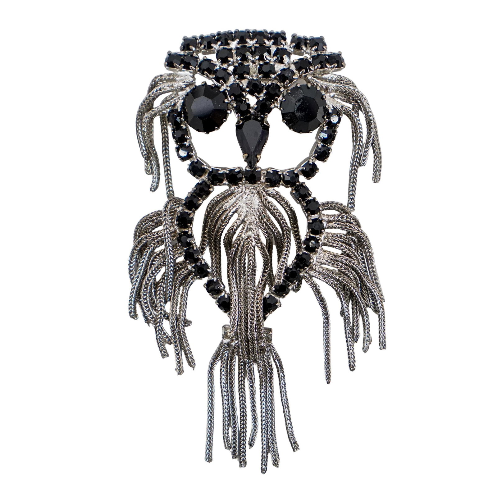 Vintage Dominique Owl Pin/Pendant: DESCRIPTION: Vintage Dominique silver tone owl pin/pendant with black faceted crystals, and silver chain tassels. CIRCA: 21st Century ORIGIN: Continental DIMENSIONS: H: 4" W: 2.5" CONDITION: Great con