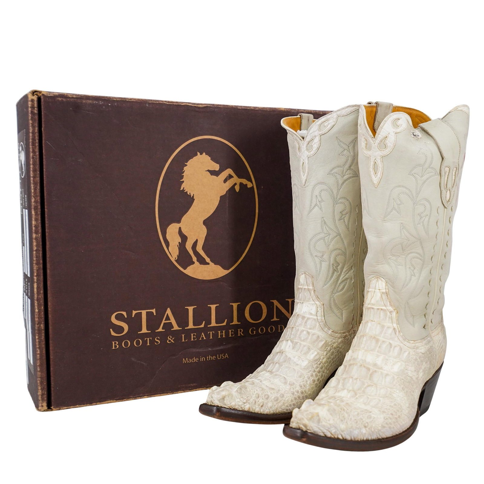 Stallion Calf Horned Back Gator Bone Western Boots: DESCRIPTION: Stallion calf horned back gator, bone/natural color western boots, pointed toe. With original box. CIRCA: 21st Century ORIGIN: USA DIMENSIONS: Size 7C CONDITION: Lightly worn Unless other