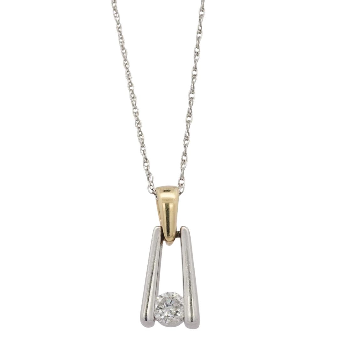 18k Gold, Platinum, and Diamond Necklace: DESCRIPTION: 18k white gold chain, featuring a platinum pendant with an 18k yellow gold bail and round cut diamond (approx. .15 carats) set in the bottom center. Hallmarked "18K PLAT 950" CIRCA: 21st 
