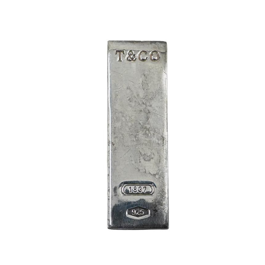 Tiffany & Co. Sterling Silver Money Clip: DESCRIPTION: Tiffany & Co. sterling silver money clip, stamped on one side "T & CO. 1837 925" and "Tiffany & Co. 925" on the other. Total weight: 26g CIRCA: 20th Century ORIGIN: USA DIMENSIONS: L: 2.2