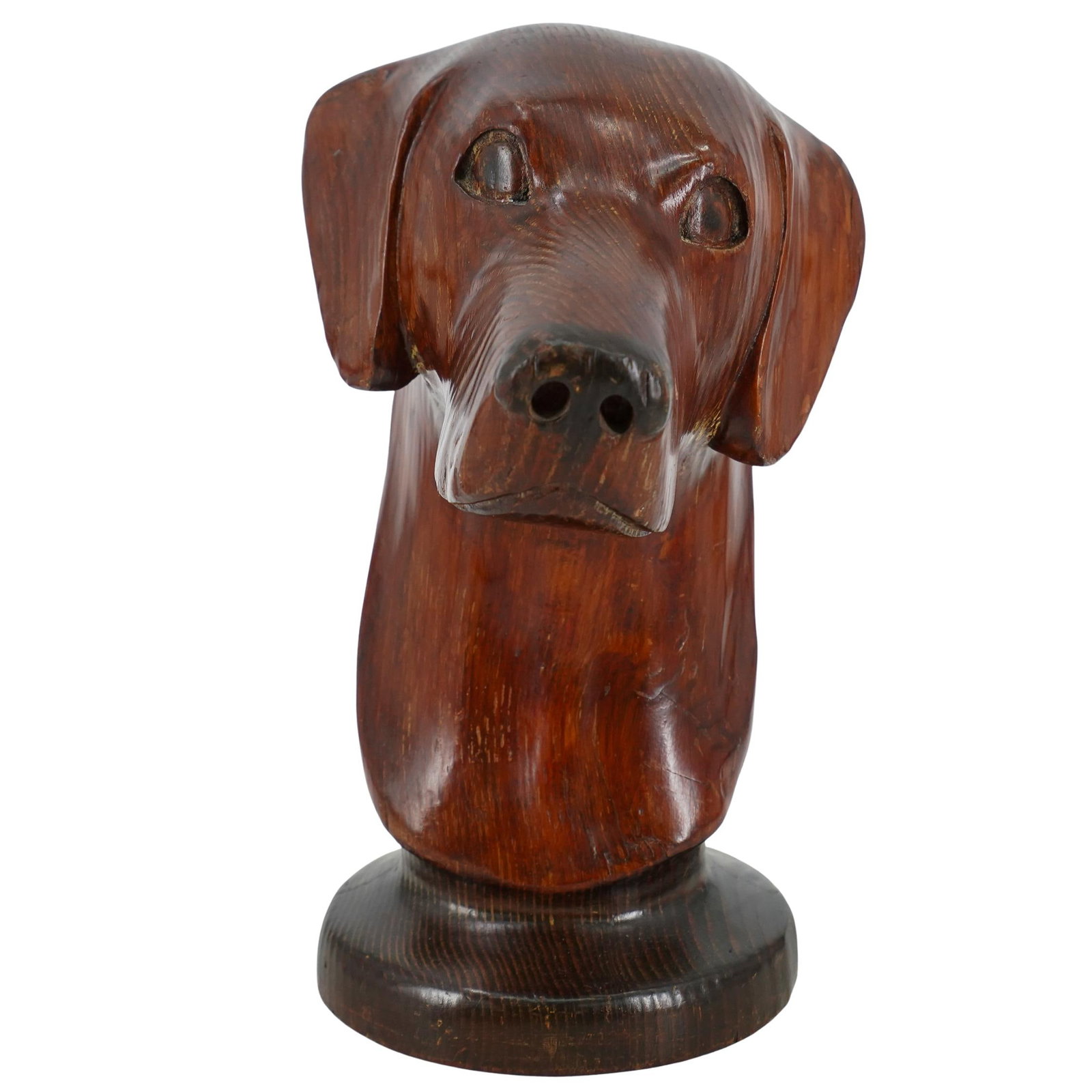 Signed Carved Wooden Lab Retriever Dog Sculpture: DESCRIPTION: Signed carved wooden labrador retriever dog sculpture. Signed Greg Jordan 1985 on the underside. CIRCA: 1985 ORIGIN: USA DIMENSIONS: H: 12" W: 10" CONDITION: With repaired crack on ear. U
