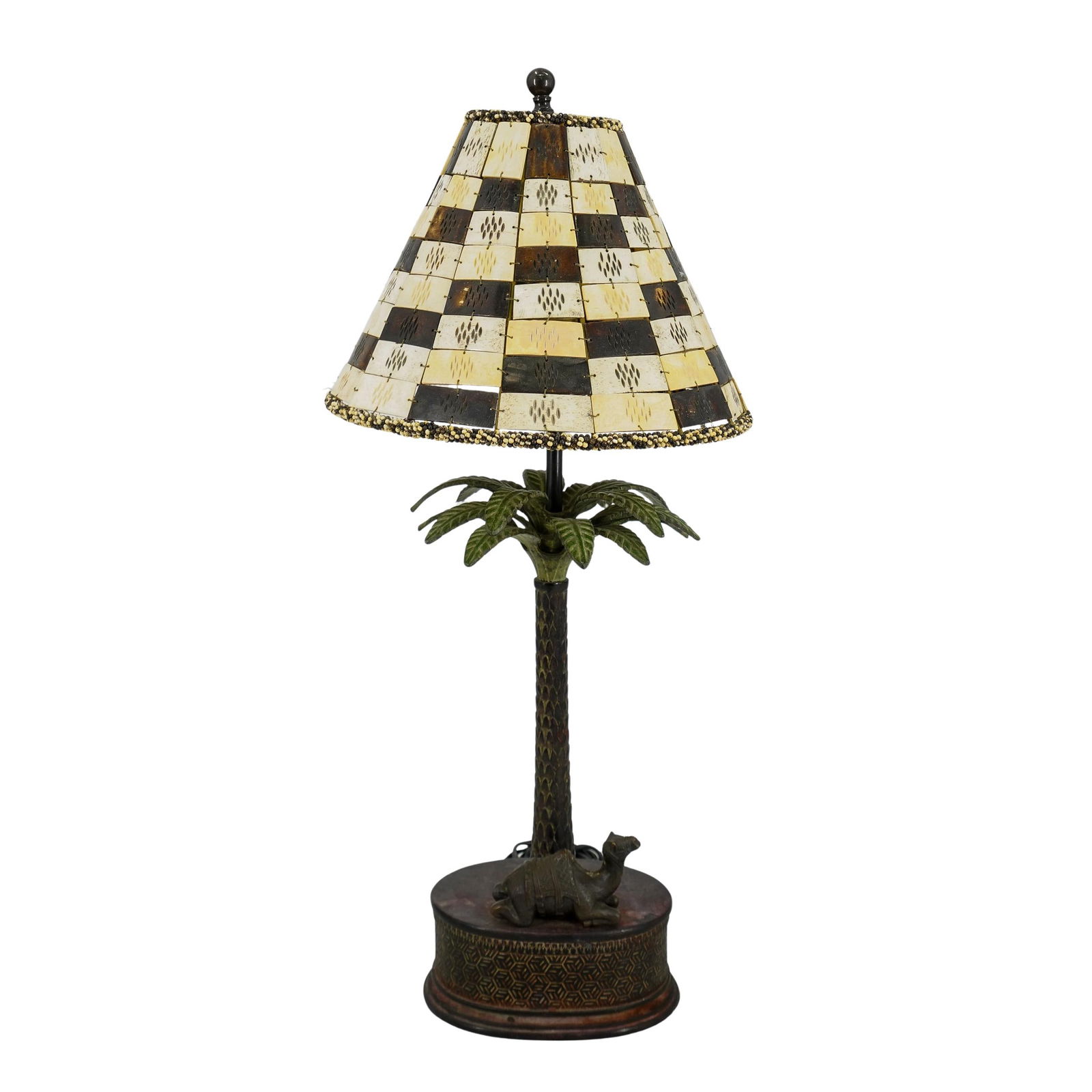 Vintage 1980s Orientalist Brass Table Lamp: DESCRIPTION: Vintage 1980s Orientalist Brass Table Lamp. Depicts a resting camel, a palm tree and a shade made of rectangular carved bone pieces. CIRCA: 1980s ORIGIN: Continental DIMENSIONS: H: 28 1/4