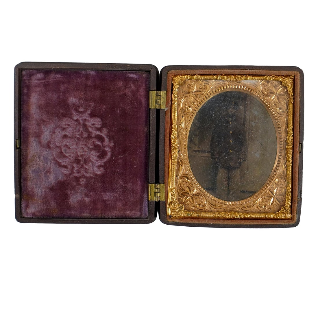 Civil War Soldier Daguerreotype in Gutta Percha Case: DESCRIPTION: Daguerreotype of young civil war soldier, housed in gutta percha case with intricate floral and scrollwork design on each side. Provenance: Private Pennsylvanian Estate CIRCA: 1860's ORIG