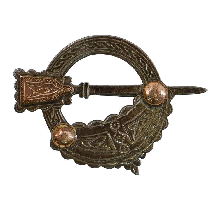 Irish Celtic Sterling Silver & 14k Gold Brooch: DESCRIPTION: Irish Celtic sterling silver brooch with 14k gold accents, made by Tara Patrick Archer. Hallmarked on reverse "PA" Total weight: 9.96g CIRCA: 20th Century ORIGIN: Ireland DIMENSIONS: H: 1