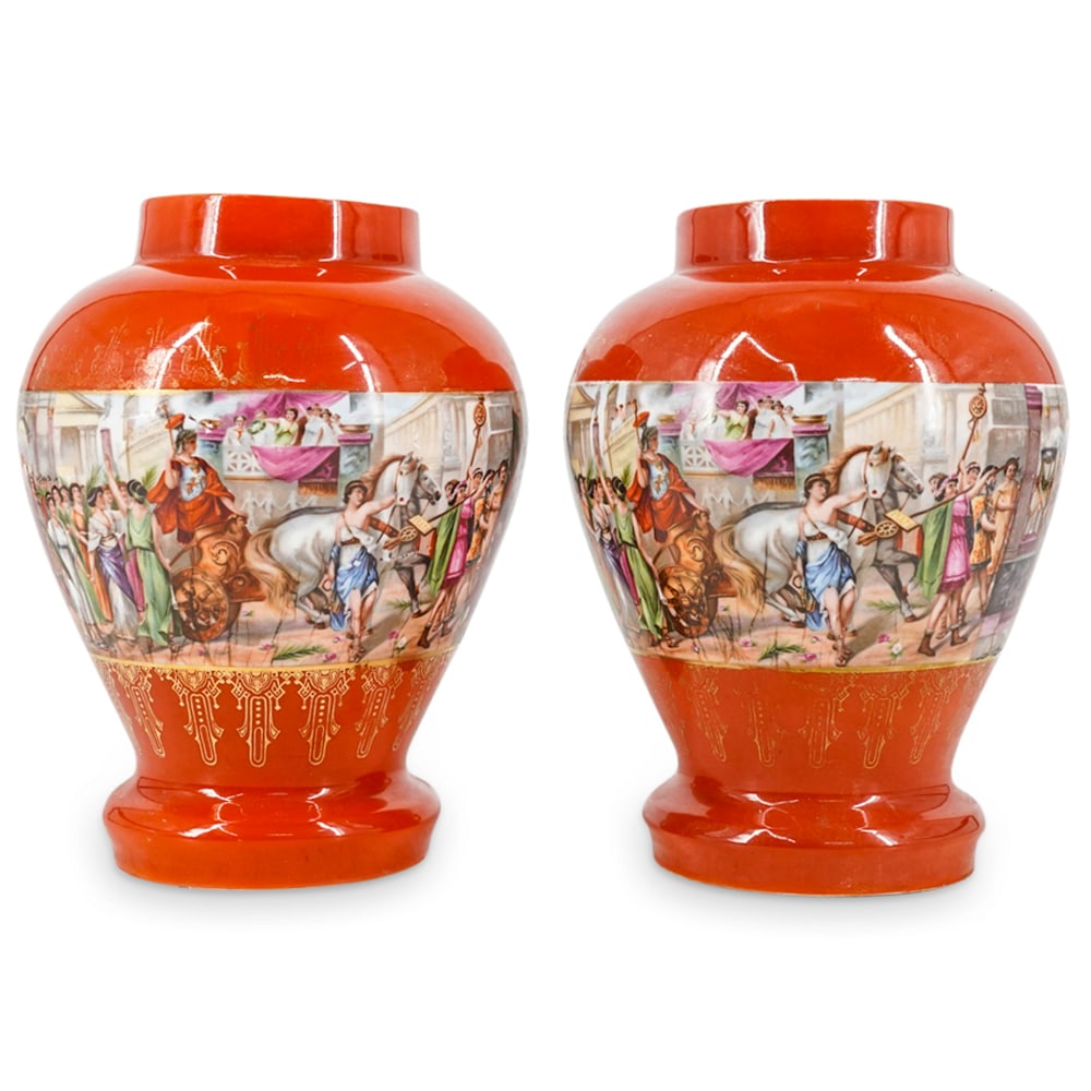 Pair Of Victoria China Bohemian Porcelain Vases: DESCRIPTION: Two matching Bohemian porcelain vases, each featuring a transferred, continuous neoclassical scene framed above and below by orange glaze finished with gilt accenting. Each piece is hallm