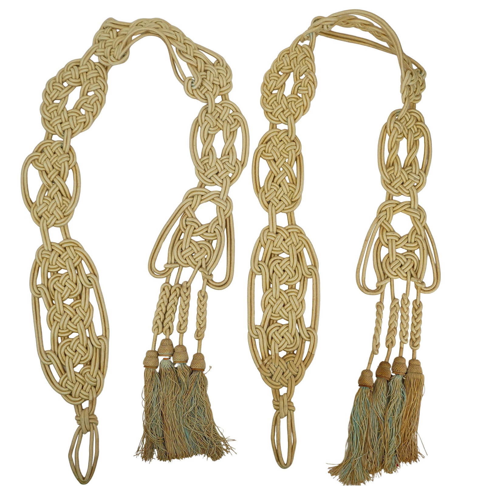 Pair of Antique French Silk Braided Appliques: DESCRIPTION: A pair of antique French silk braided appliques with tassels. CIRCA: 20th Cent. ORIGIN: France DIMENSIONS: L: 72" x L: 6.25" CONDITION: Minor discoloration and fraying in overall very goo