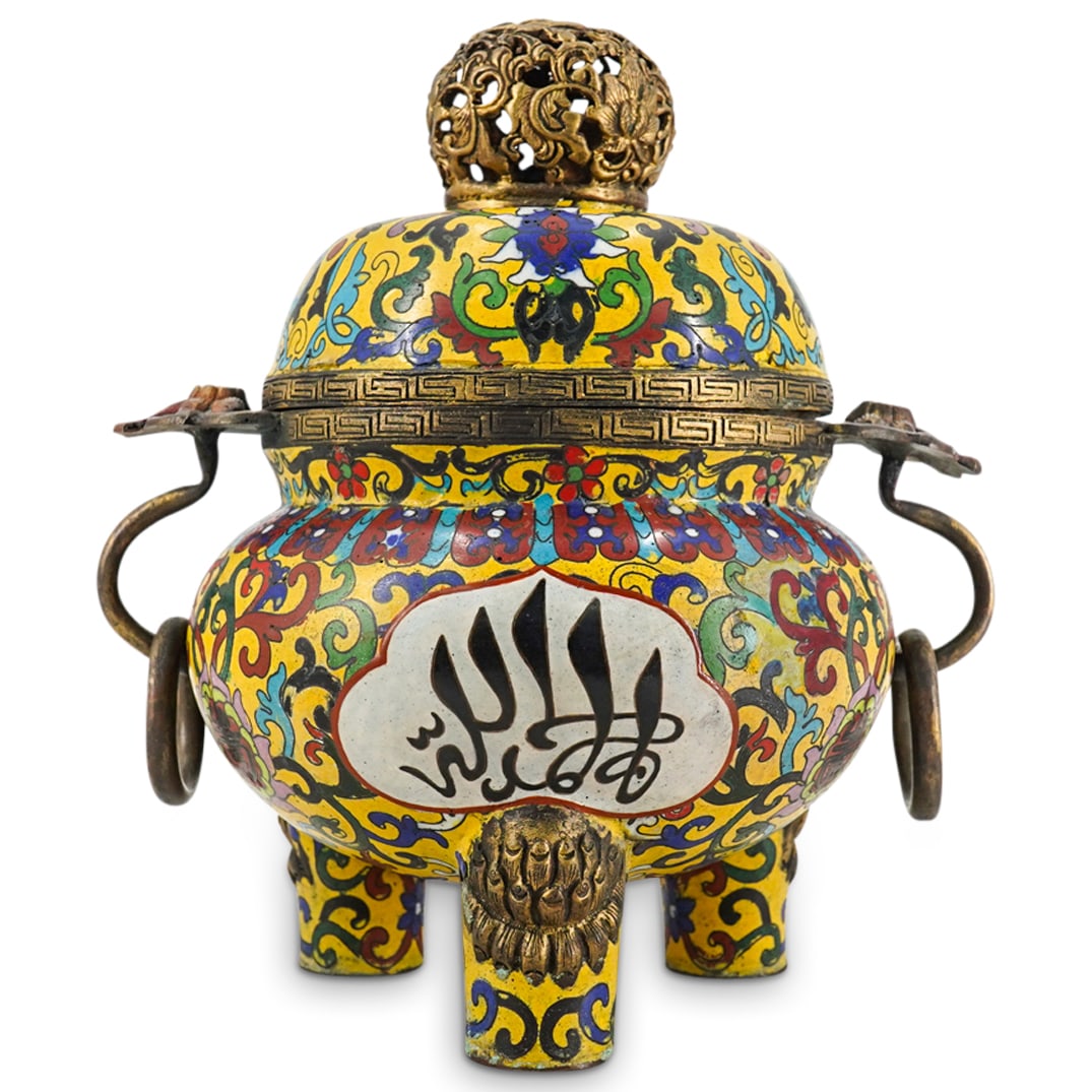 Antique Sino-Islamic Cloisonne Censer: DESCRIPTION: Sino-Islamic export cloisonne censer for the Islamic market featuring floral and foliage motifs, pierced finial, three legs, and lotus-form handles decorated with enamel. CIRCA: 19th Cent