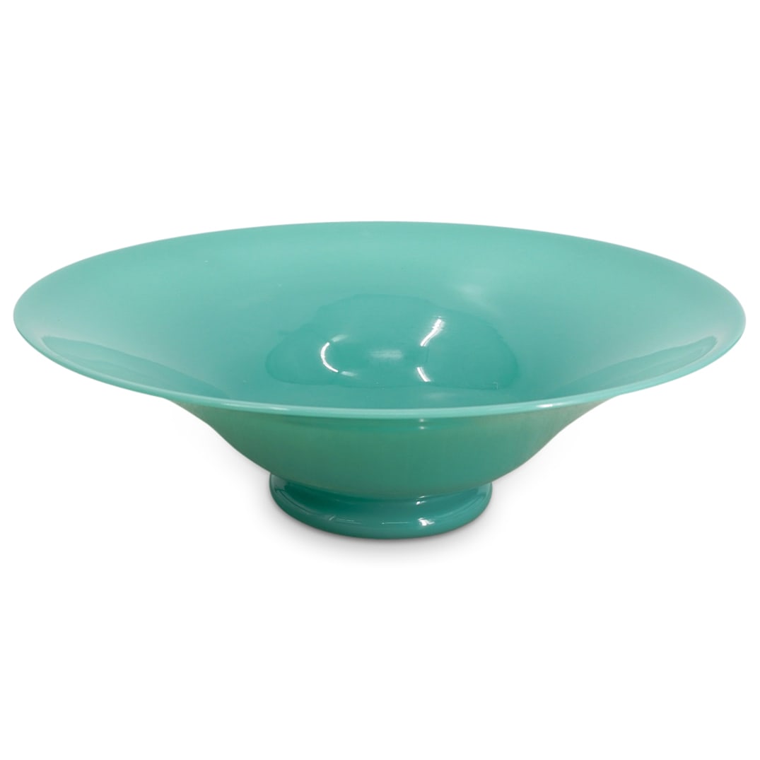 Steuben Turquoise Glass Centerpiece Bowl: DESCRIPTION: Steuben turquoise art glass centerpiece bowl, featuring a rounded footed base. CIRCA: 20th Century ORIGIN: USA DIMENSIONS: H: 4.75" D: 15.75" CONDITION: Good condition Unless otherwise st