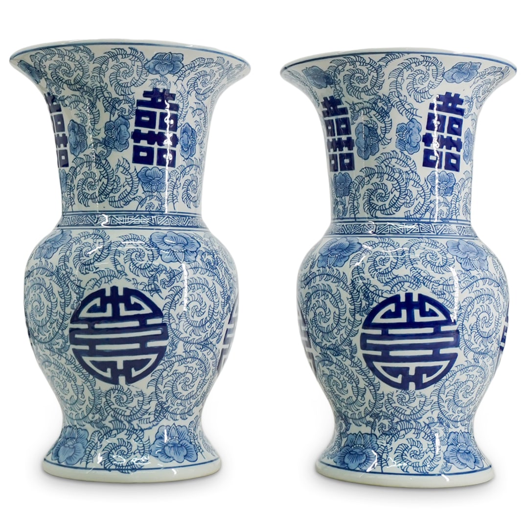 Pair of Chinese Porcelain Blue and White Hu Vases: DESCRIPTION: Pair of Chinese Porcelain Blue and White Hu form Vases, decorated with happiness symbols and floral vines patterns. CIRCA: Mid-Late 20th Cent. ORIGIN: China DIMENSIONS: H: 14.5" W: 8" CON