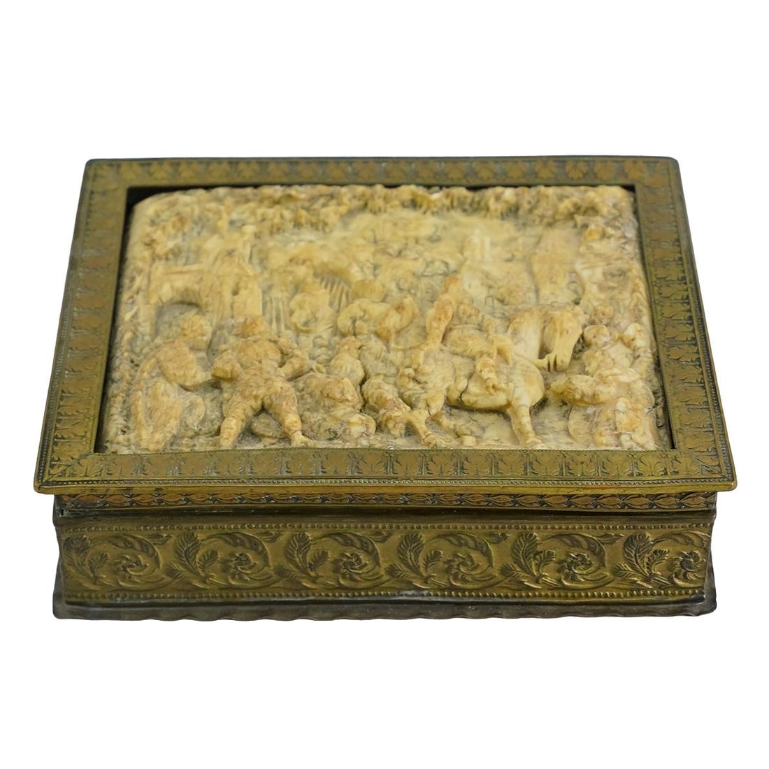 19th C. German Carved Bone Box: DESCRIPTION: 19th Century German brass box with rectangular form, featuring a hand carved inset bone plaque depicting a Renaissance scene, with scrolling floral patterns. CIRCA: 19th Cent. ORIGIN: Ger