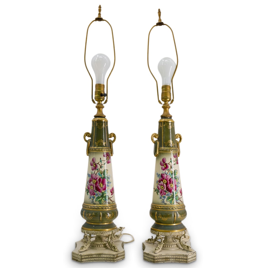 Pair Hand Painted Floral Porcelain Lamps: DESCRIPTION: Pair of porcelain lamps, featuring hand painted flowers with olive green trim and gilt accents, mounted to metal bases. CIRCA: 20th Century ORIGIN: Continental DIMENSIONS: H: 23.5" W: 6.7